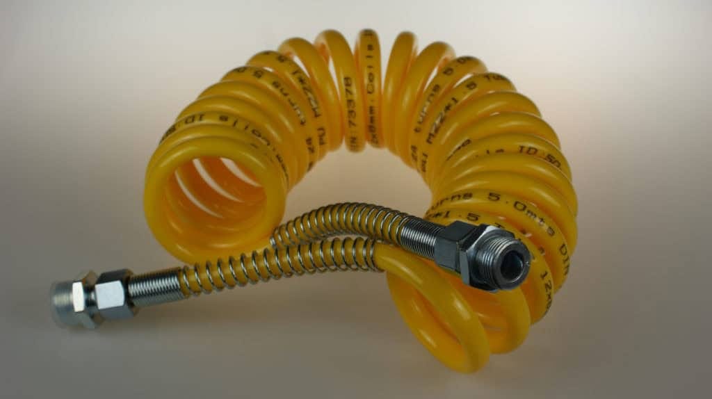 Przewód spiralny pneumatyczny okuty M16x1,5 5,5mb ŻÓŁTY